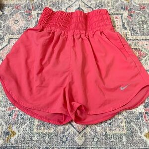 Size small, pink, high wasted Nike shorts